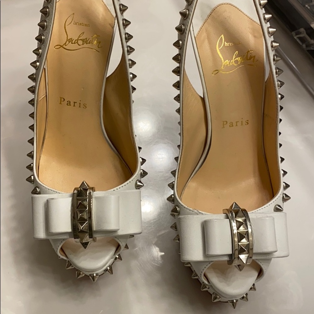 Christian Louboutin, never worn w sole protector